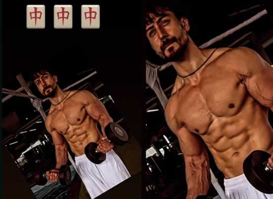 Tiger Shroff to flaunt his chiseled abs post workout session!