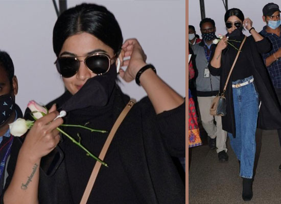 Rashmika Mandanna gets clicked carrying roses at the airport!